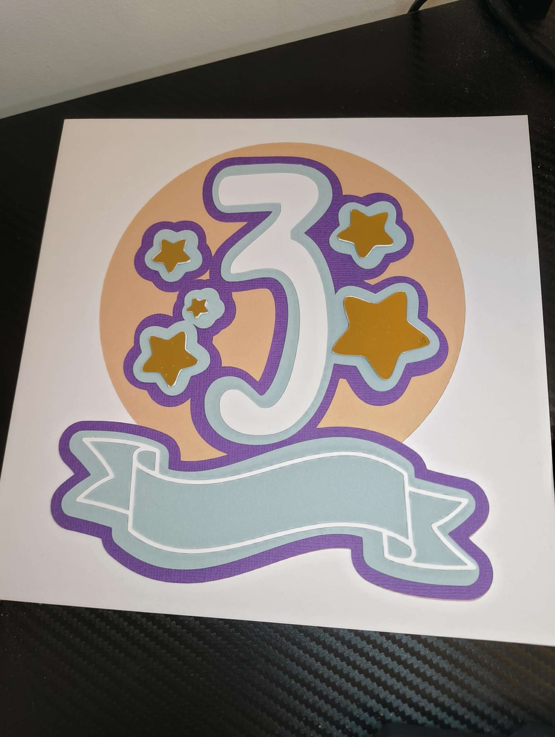 3rd birthday card with colorful number three and stars design, perfect for kids' milestone celebration.